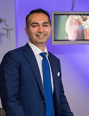 Associate Professor Sumit Raniga with his orthopaedic shoulder simulator.