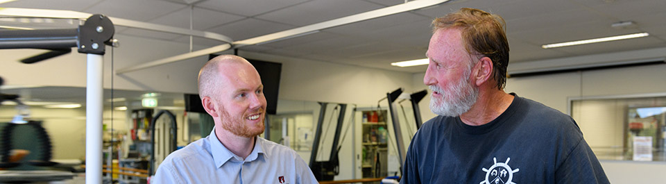 A clinician working with a patient
